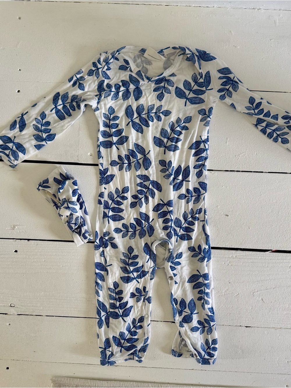 Kids White One-Piece Pajamas with Blue Leaf Print